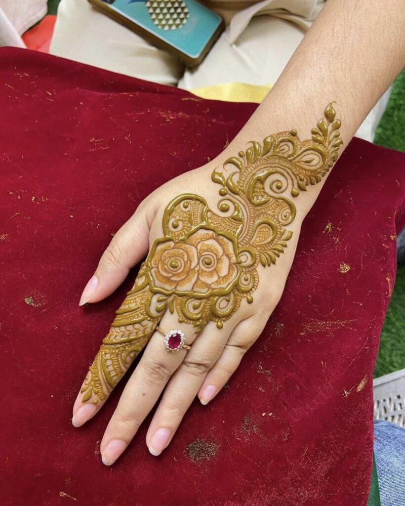 A Girls is Showing Their Hands Arabic Mehndi Design by Henna House- Arabic Mehndi Artist in Jaipur.