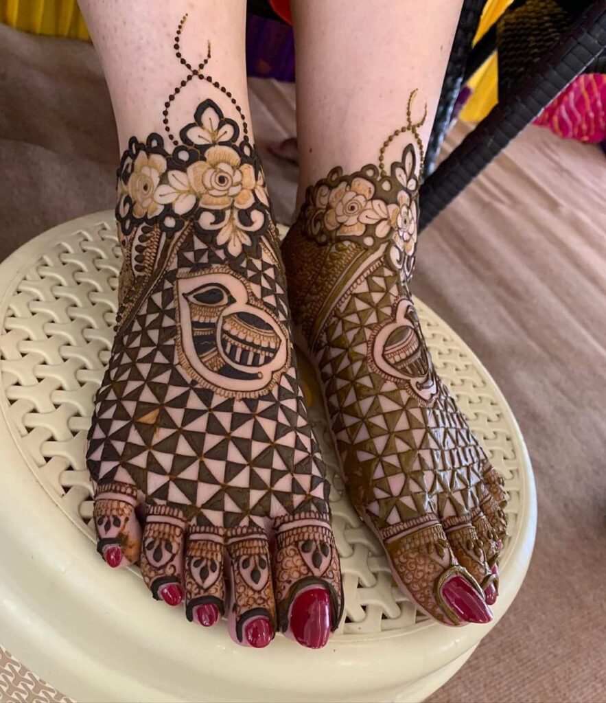 A Girls is Showing Their Legs Bridal Mehndi Design by Henna House- Moroccan Mehndi Artist in Jaipur.