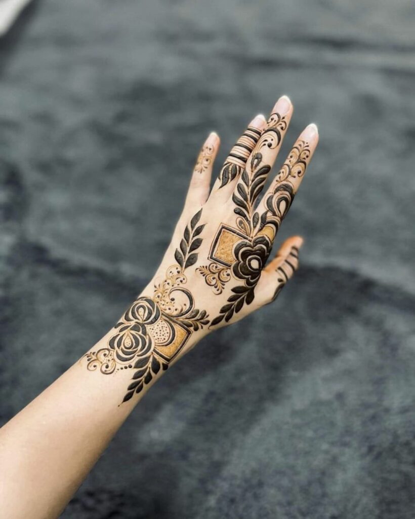 A Girls is Showing Their Hands Tattoo Mehndi Design by Henna House- Tattoo Mehndi Artist in Jaipur.